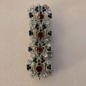 Woman’s Fashion bracelet with Ruby Red, Emerald Green & Diamond gemstones.